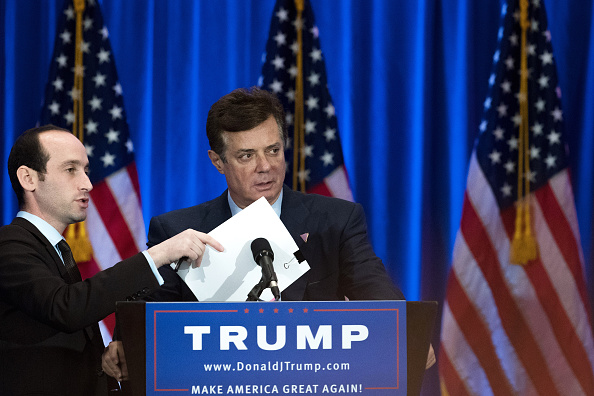 NEW YORK NY- JUNE 22 Campaign chairman Paul Manafort checks the podium before Republican Presidential candidate Donald Trump speaks during an event at Trump SoHo Hotel