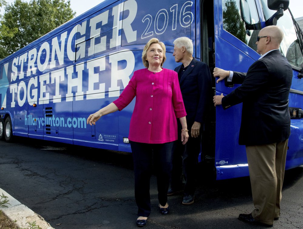 Democratic presidential nominee Hillary Clinton and former President Bill Clinton make a campaign stop last month in Pennsylvania. Their foundation funds health-care education and environmental initiatives around the world but has been criticized for