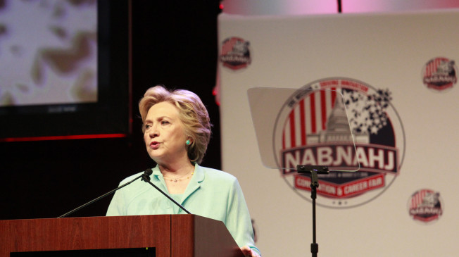 Democratic presidential nominee Hillary Clinton addresses the 2016 National Association of Black Journalists and National Association of Hispanic Journalists joint convention Friday Aug. 5 2016 in Washington