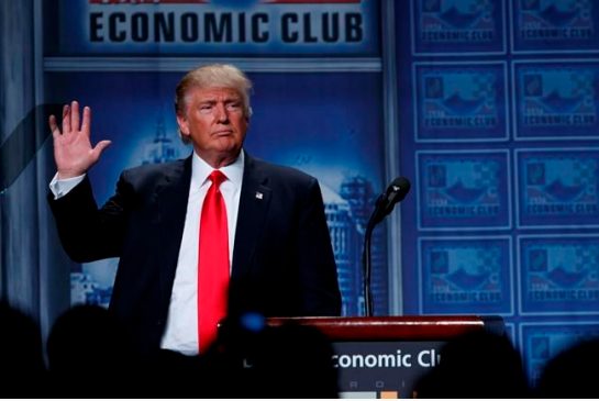 Republican presidential candidate Donald Trump waves after delivering an economic policy speech to the Detroit Economic Club Monday Aug. 8 2016 in Detroit