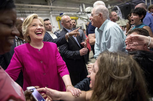 Democratic presidential candidate Hillary Clinton greets members of the audience after speaking at a rally at K'NEX a toy company in Hatfield Pa. Friday