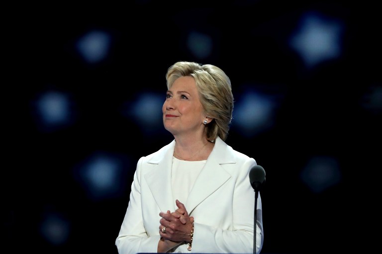 Democratic presidential nominee Hillary Clinton acknowledges the crowd as she arrives on stage during the fourth day of the Democratic National Convention at the Wells Fargo Center in Philadelphia