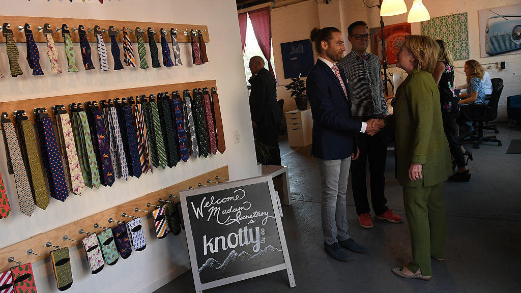 Democratic presidential nominee Hillary Clinton visits the Knotty Tie Company Wednesday in Denver Colo