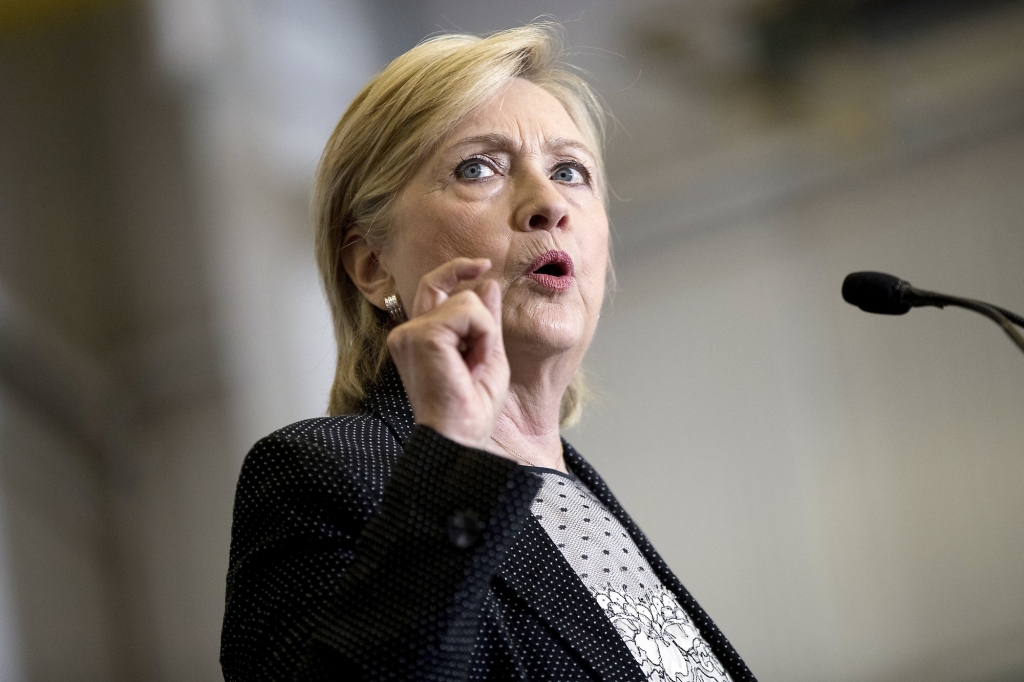 Democratic presidential candidate Hillary Clinton speaks in Warren Mich. Hillary Clinton is ready to call out Donald Trump and his advisers for embracing a œdisturbing alt-right  political philosophy that