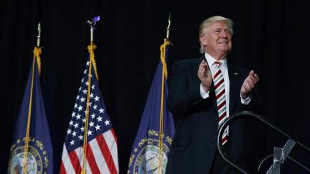 Republican presidential candidate Donald Trump arrives for a campaign rally in New Hampshire