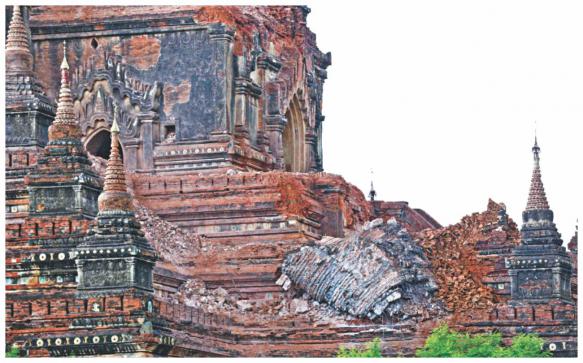 Collapsed walls surround an ancient pagoda after a 6.8 magnitude earthquake hit Bagan of Myanmar later in the day