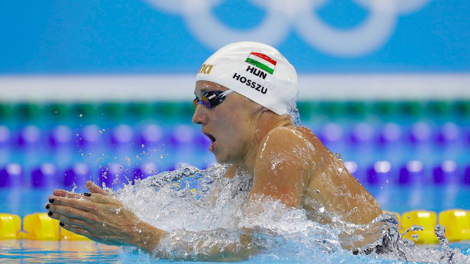 Hungary's Katinka Hosszu competes as she sets a new world record and wins the gold medal in the women's 400-meter individual medley final during the swimming competitions at the 2016 Summer Olympics Saturday Aug. 6 2016 in Rio de Janeiro Brazil