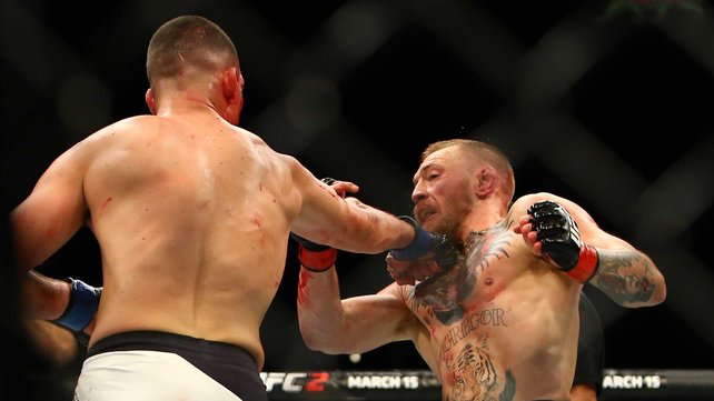 Nate Diaz lands a shot on Conor Mc Gregor during their first meeting in Las Vegas