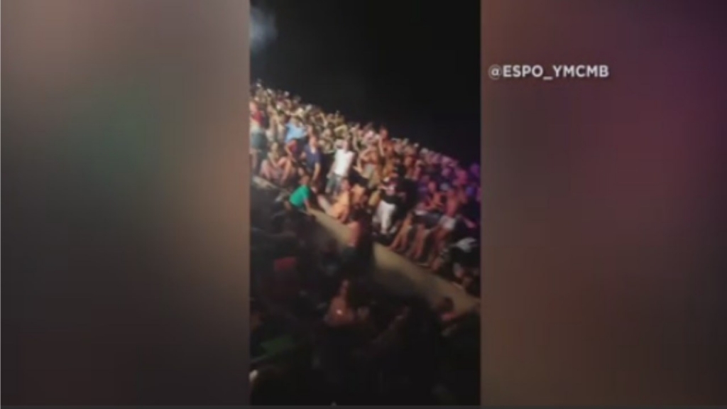 Concertgoers fell about 10 ft onto concrete floor when the railing collapsed