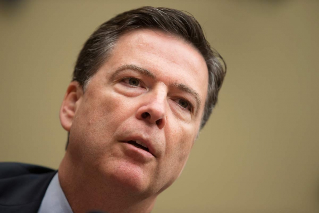 FBI Director James Comey testifies on Capitol Hill in Washington before the House Oversight Committee to explain his agency's recommendation to not prosecute Hillary Clinton now the Democratic presidential candidate