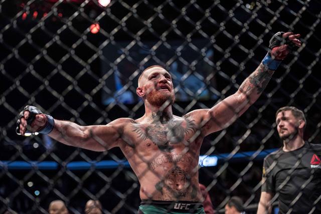 Conor Mc Gregor acknowledges the crowd after his win