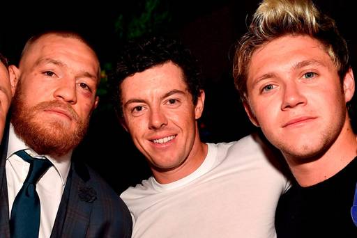 Niall Horan and Rory Mc Ilroy celebrate with Conor Mc Gregor UFC 202 victory during the official after-fight party at Intrigue Nightclub at Wynn Las Vegas