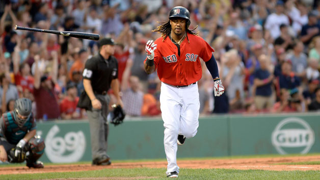 Hanley Ramirez #13 of the Boston Red Sox flips his bat after hitting a home run in the first inning against the Arizona Diamondbacks