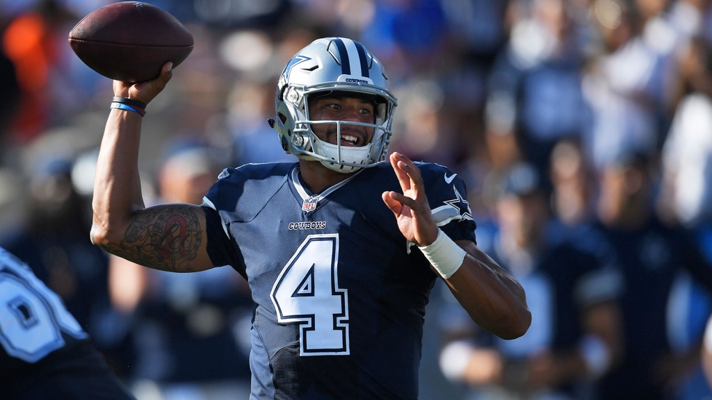 LOS ANGELES CALIFORNIA- AUGUST 13 Quarterback Dak Prescott #4 of the Dallas Cowboys throws a pass against the Los Angeles Rams at the Los Angeles Coliseum during preseason