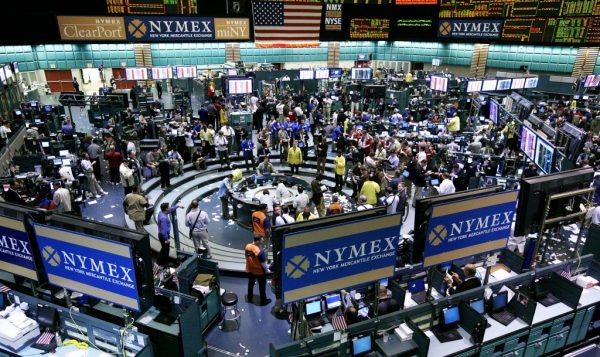 FILE ** Crude oil traders work in the half empty pit on the floor of the New York Mercantile Exchange in this Feb. 21 2008 file