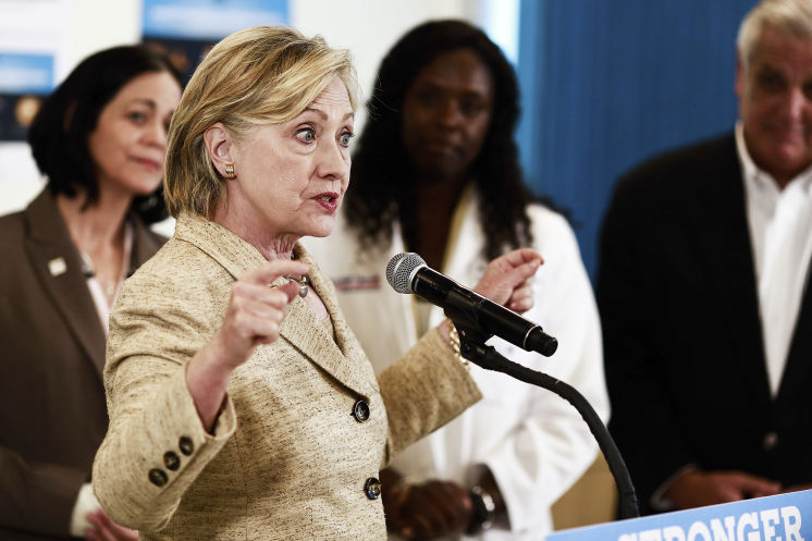 Hillary Clinton the Democratic presidential nominee speaks at the Borinquen Health Care Center in Miami on Tuesday. The center is near the area identified by the CDC where the Zika virus is being spread by mosquitos