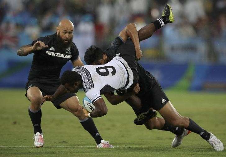 2016 Rio Olympics- Rugby- Men's Quarter-final- Fiji v New Zealand- Deodoro Stadium- Rio de Janeiro Brazil- 10/08/2016. Rieko Ioane of New Zealand tackles Seremaia Tuwai Vunisa of Fiji. REUTERS  Phil Noble