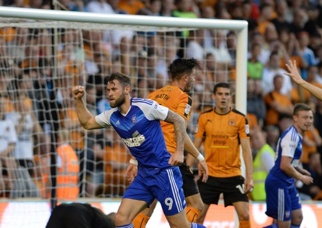 Daryl Murphy prematurely celebrates his subsequently disallowed first half goal at Wolves