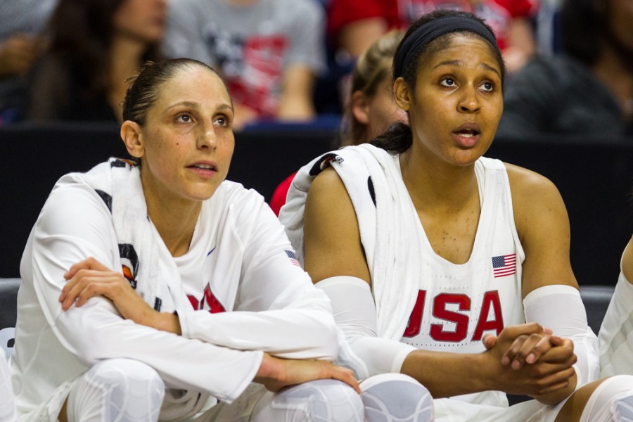 Team USA's Sue Bird and Maya Moore watch from the bench during an international women's exhibition basketball game between Team USA and Canada at Webster Bank Arena in Bridgeport CT