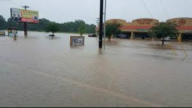 Debris piles mark the start long road to recovery in flooded Louisiana