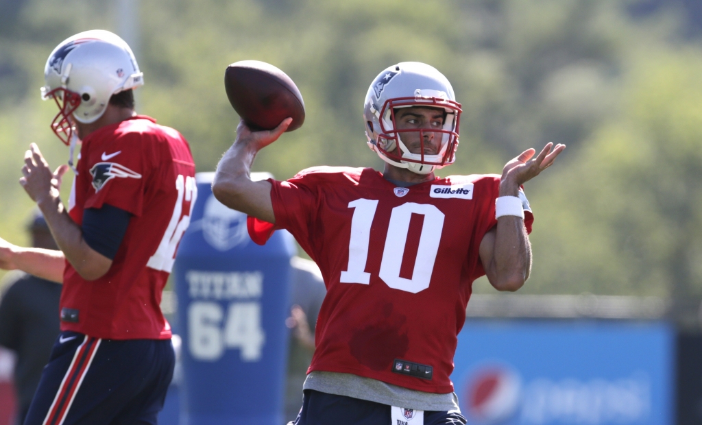 New England Patriots quarterback Jimmy Garappolo throws during an NFL football training camp in Foxborough Mass. The Patriots will open camp July 27 knowing the cornerstone of their franchise wont be available