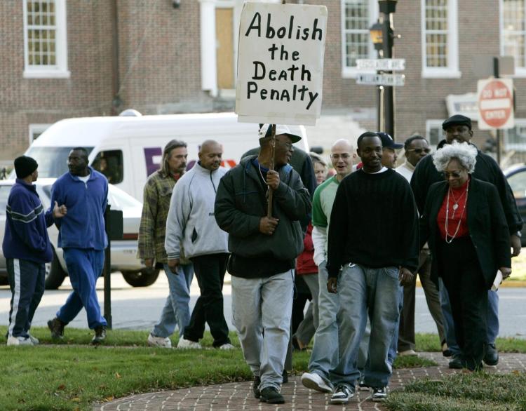 Death penalty opponents marched in protest in front of Legislative Hall in Dover Del. in 2005 ahead of a scheduled execution. The state Supreme Court ruled Delaware's death penalty law unconstitutional Tuesday