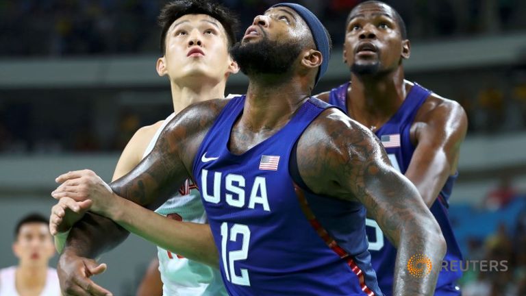 Demarcus Cousins of USA Kevin Durant of the USA and Li Muhao of China compete. REUTERS  Lucy Nicholson