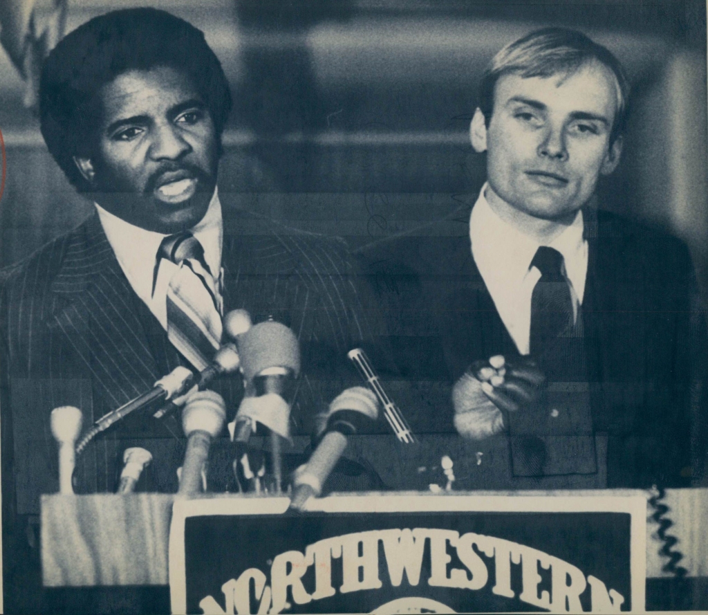 Dennis Green speaks to reporters after being introduced as Northwestern's new football coach in December 1980. With him is athletic director Doug Single. | Sun Times file