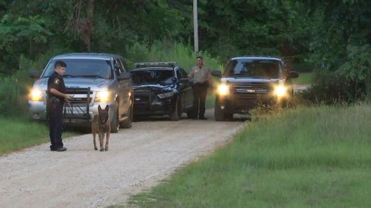 Deputies on the scene of the mass murder Saturday