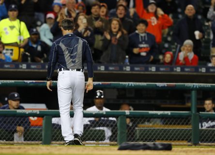 Detroit Tigers manager Brad Ausmus storms off the field leaving his sweatshirt in the dust