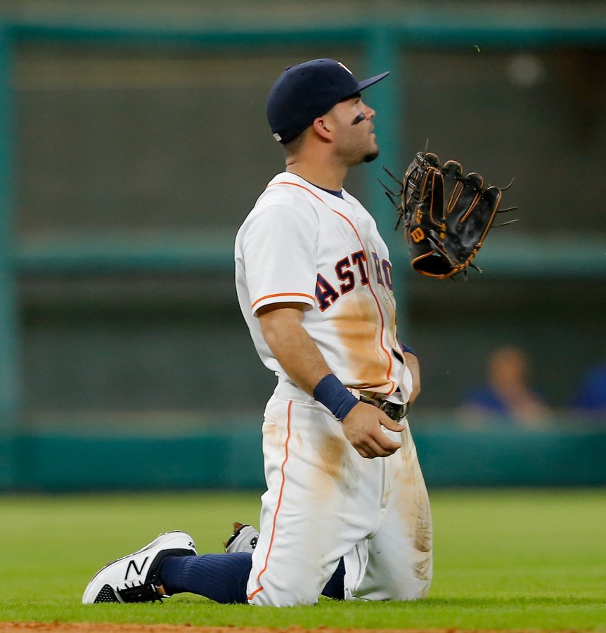 Houston Astro's second baseman Jose Altuve cannot make the play on a line drive by the Blue Jay's Melvin Upton Jr. on Tuesday at Minute Maid Park in Houston