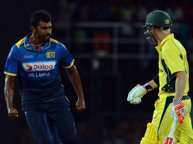 Sri Lanka's Thisara Perera celebrates after he dismissed Australia's David Warner during the second one-day International cricket match between Sri Lanka and Australia at The R Premadasa International Cricket Stadium in Colombo