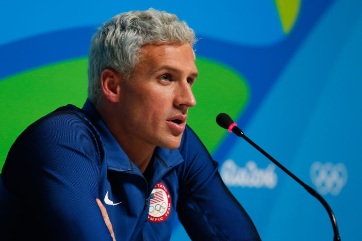 Ryan Lochte of the United States attends a press conference in the Main Press Center on Day 7 of the Rio Olympics on Aug. 12 in Rio de Janeiro Brazil. On Friday he apologized for his behavior surrounding a late-night incident at a Rio de Janeiro gas sta