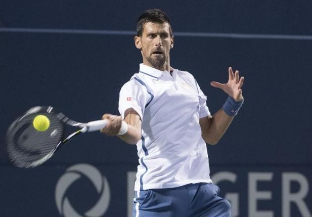 Jul 30 2016 Toronto Ontario Canada Novak Djokovic attempts to return a ball during the singles semi final match at the Rogers Cup tennis tournament at Aviva Centre. Novak Djokovic of Serbia won 6-3 6-2. Mandatory Credit Nick Turchiaro-USA TODAY Spo