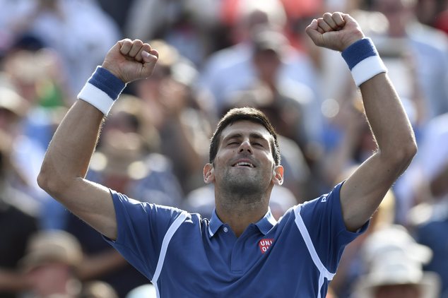 Novak Djokovic of Serbia celebrates his win over Kei Nishikori of Japan during the men's final of the Rogers Cup tennis tournament Sunday