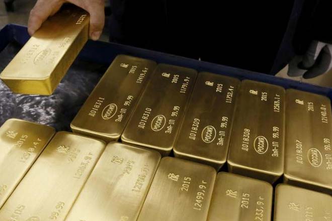 Gold fell for the first time in five sessions early on Friday as hawkish comments from US Federal Reserve officials renewed bets on a US rate hike this year