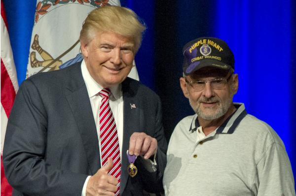 Veteran gives Donald Trump Purple Heart at VA campaign rally