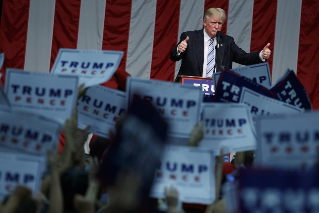 Donald Trump gives a thumbs up after speaking at a campaign rally at Sacred Heart University in Fairfield Conn. on Saturday