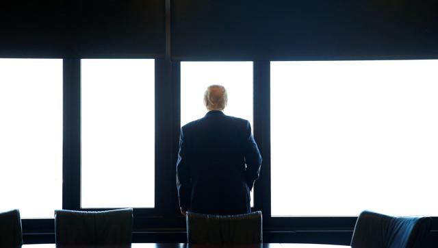 Donald Trump looks out at Lake Michigan during a visit to the Milwaukee County War Memorial Center in Milwaukee Wisconsin on Tuesday