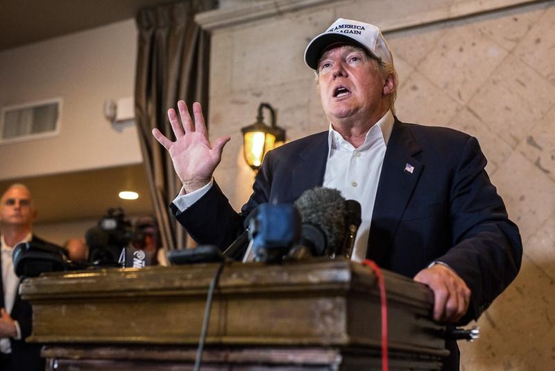 Donald Trump responds to questions during a 2015 trip to Laredo