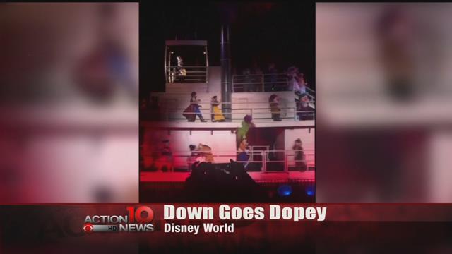 Dopey the dwarf falls off Fantasmic float at Disney World but his fall is broken by Goofy