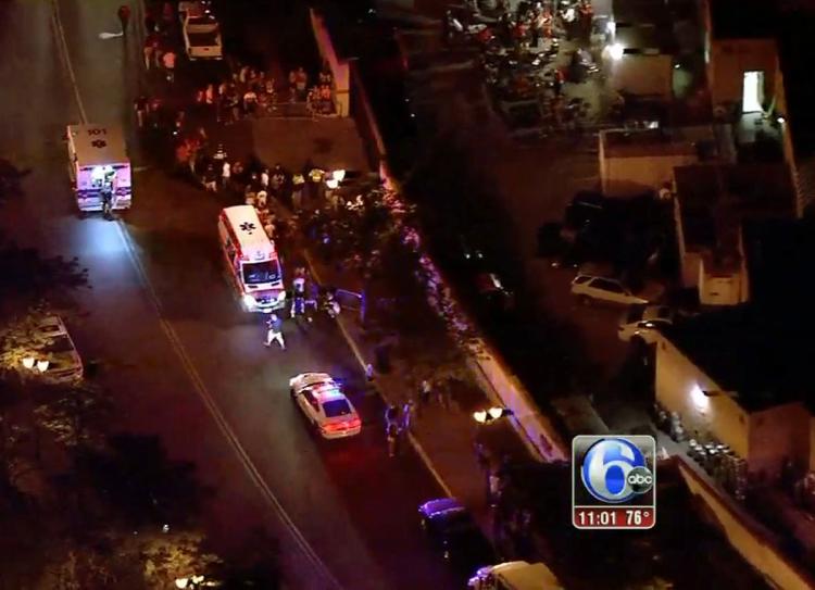 Ambulances outside the BB&T Pavilion after a railing collapsed at a Snoop Dogg  Wiz Khalifa concert in Camden N.J. Friday