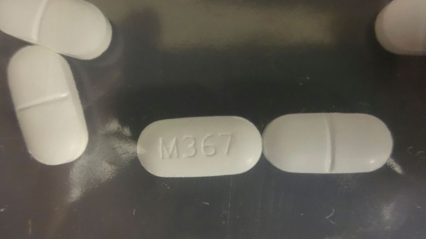 A seized counterfeit hydrocodone tablets in the investigation of a rash of fentanyl overdoses in northern California is shown in this Drug Enforcement Administration