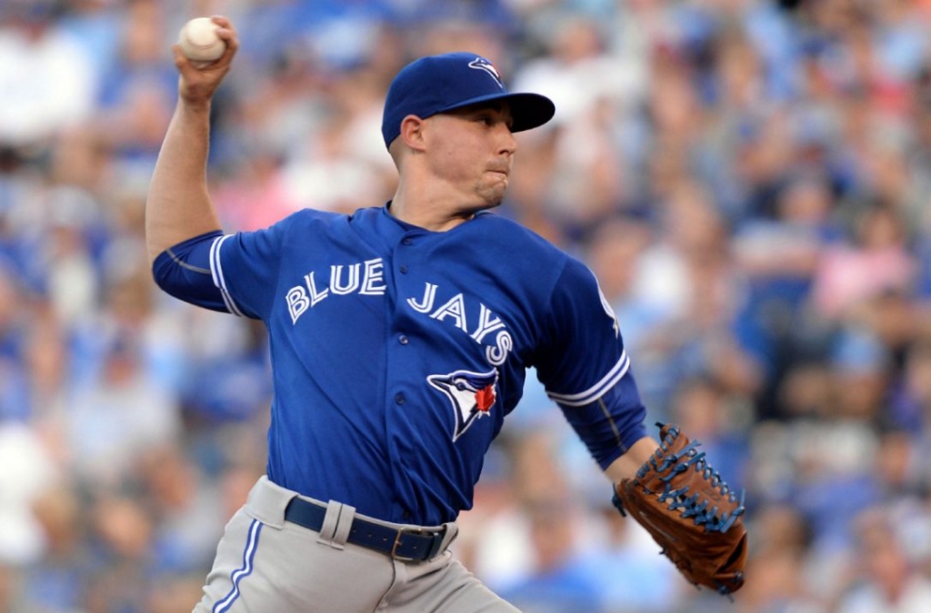 Toronto Blue Jays starting pitcher Aaron Sanchez delivers a pitch against the Kansas City Royals in the second inning at Kauffman Stadium