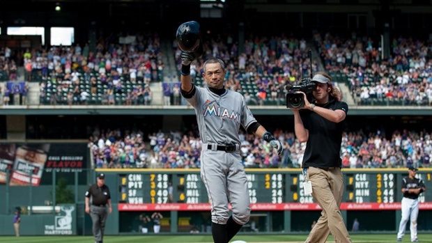 DENVER CO- AUGUST 5 Giancarlo Stanton #27 of the Miami Marlins runs out a first inning RBI double against the Colorado Rockies at Coors Field