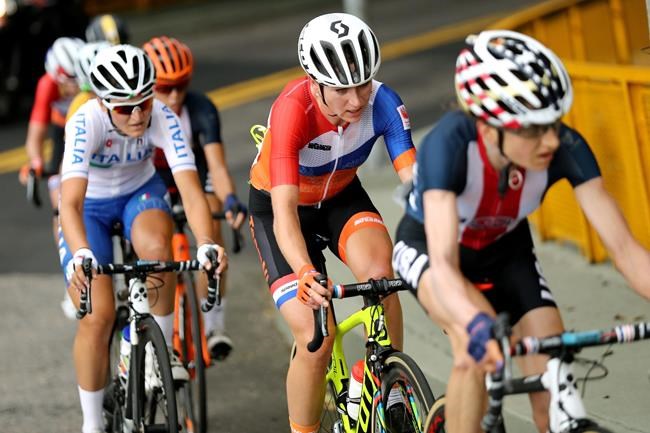 Mara Abbott of the United States leads Annemiek van Vleuten of the Netherlands during the women's cycling road race at the 2016 Summer Olympics in Rio de Janeiro Brazil Sunday Aug. 7 2016