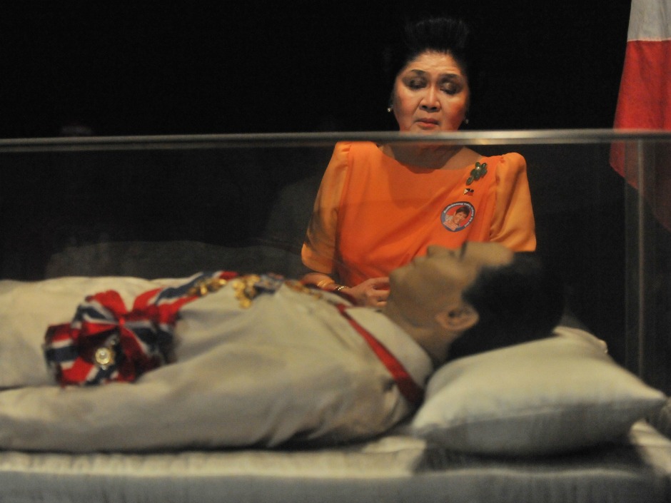 26 2010 shows former Philippine first lady Imelda Marcos looking at the embalmed body of her husband former leader Ferdinand Marcos