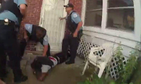 Police surround Paul O'Neal on floor