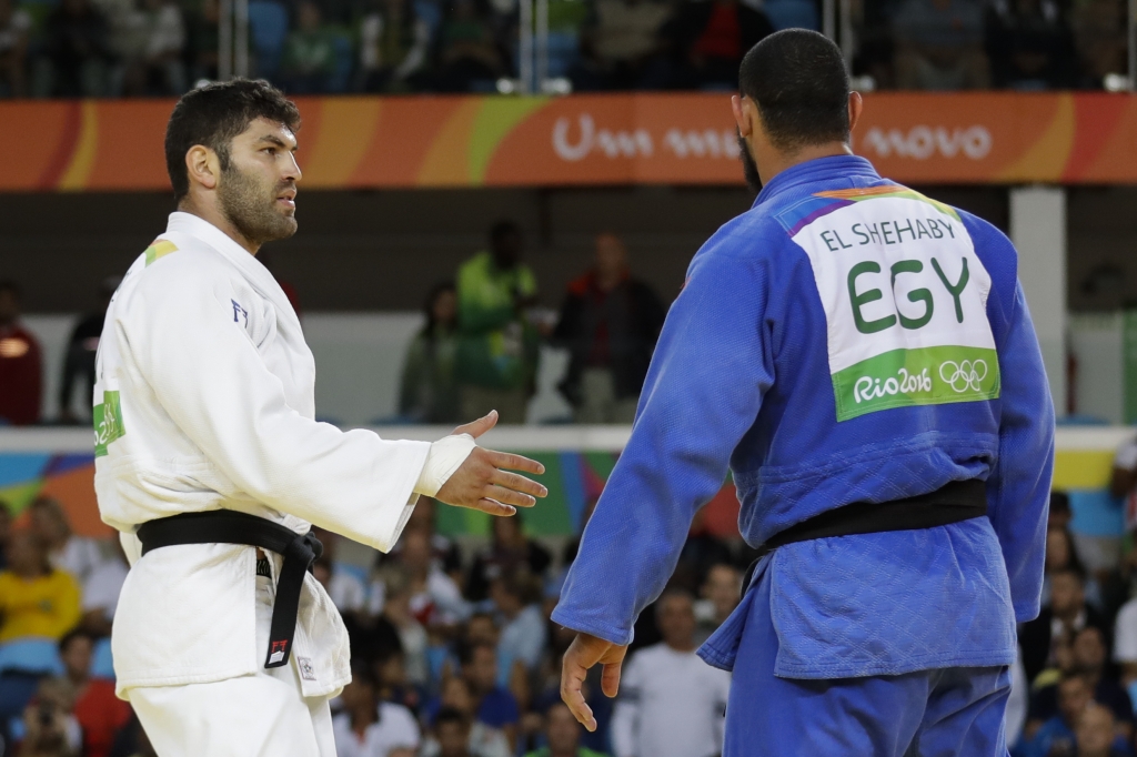 Egypt's El Shehaby declined to shake hands with Israel's Sasson after losing in the men's over 100-kg judoAP:Associated Press