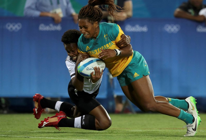 2016 Rio Olympics- Rugby- Preliminary- Women's Pool A Australia v Fiji- Deodoro Stadium- Rio de Janeiro Brazil- 06/08/2016. Ellia Green of Australia beats Raijieli Daveua of Fiji to score. REUTERS  Phil Noble